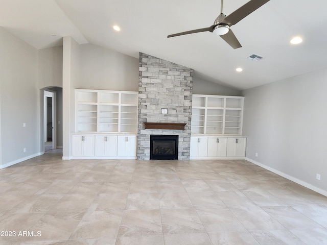 unfurnished living room featuring built in features, a fireplace, ceiling fan, lofted ceiling, and light tile flooring