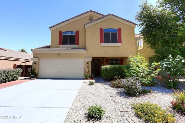 view of front of property featuring a garage