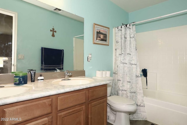 full bathroom featuring toilet, dual vanity, and shower / bathtub combination with curtain