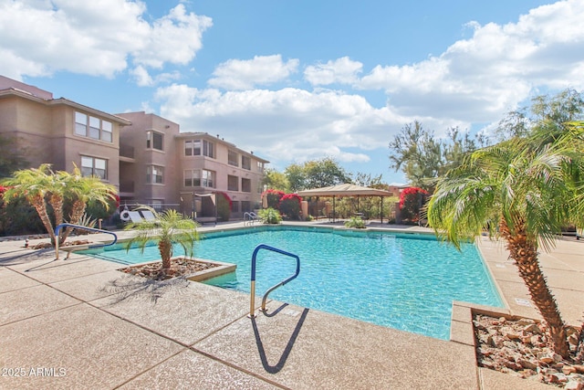 view of pool with a gazebo and a patio