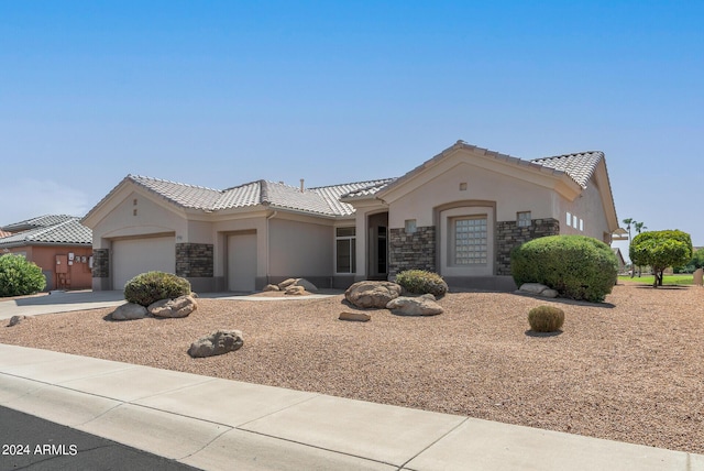 view of front of home featuring a garage