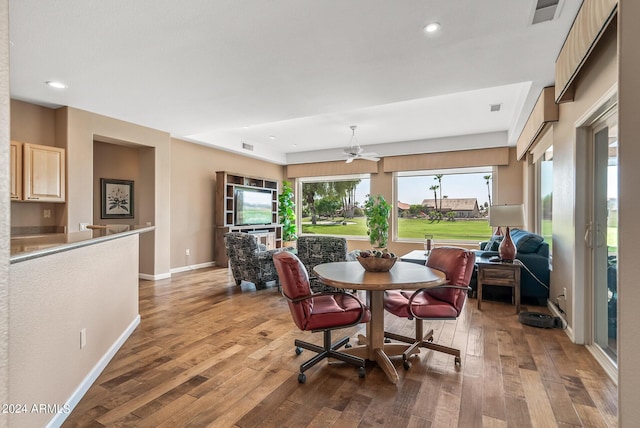 dining space with light wood-type flooring