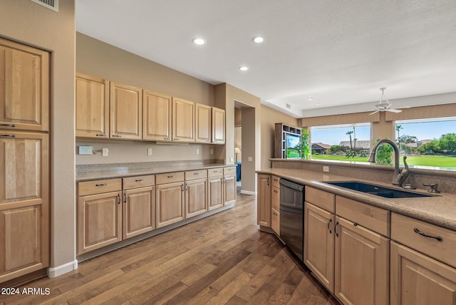 kitchen with dark wood-type flooring, sink, light brown cabinets, dishwasher, and ceiling fan