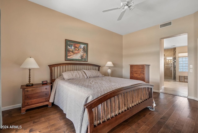 bedroom featuring ceiling fan, connected bathroom, and dark hardwood / wood-style flooring