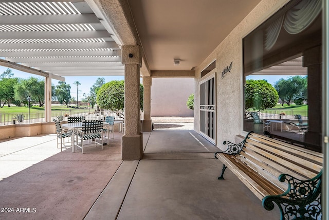 view of patio featuring a pergola