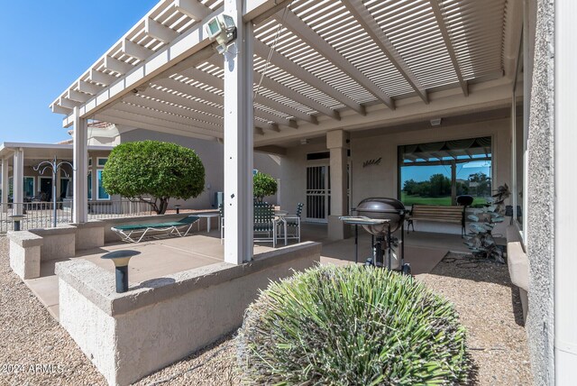 view of patio featuring a pergola