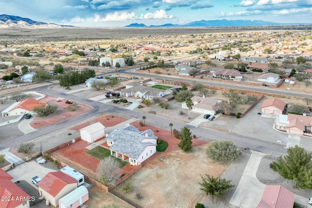 birds eye view of property featuring a mountain view