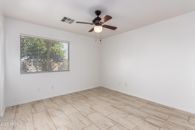 unfurnished room featuring ceiling fan