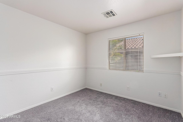 unfurnished room featuring carpet floors