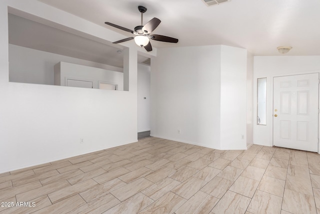 interior space featuring lofted ceiling and ceiling fan