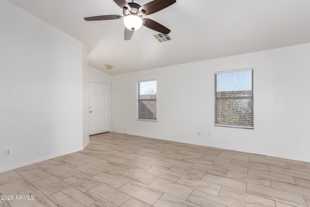 unfurnished room with vaulted ceiling and ceiling fan