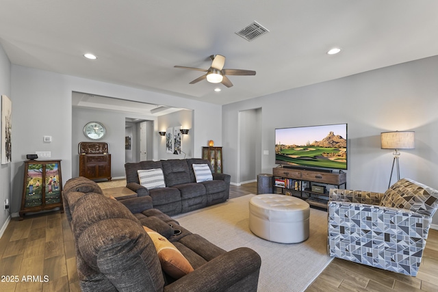 18865 W Mescal St, Surprise, AZ 85388 - living room with wood finished floors, ceiling fan, and recessed lighting