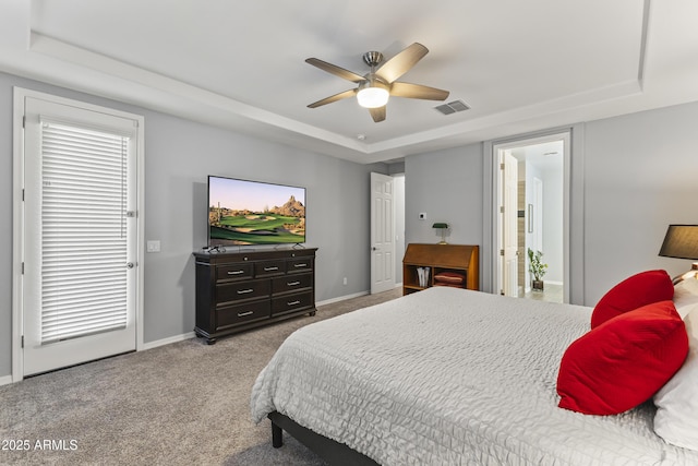 18865 W Mescal St, Surprise, AZ 85388 - carpeted bedroom featuring a raised ceiling and ceiling fan