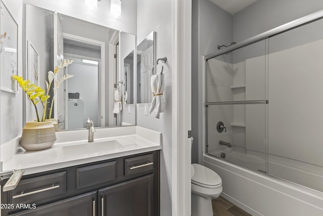 18865 W Mescal St, Surprise, AZ 85388 - full bath featuring vanity, combined bath / shower with glass door, and wood finished floors