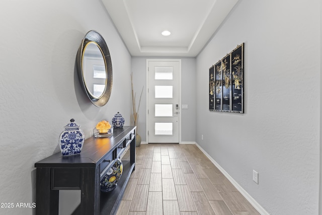 18865 W Mescal St, Surprise, AZ 85388 - foyer entrance featuring wood finish floors and a raised ceiling