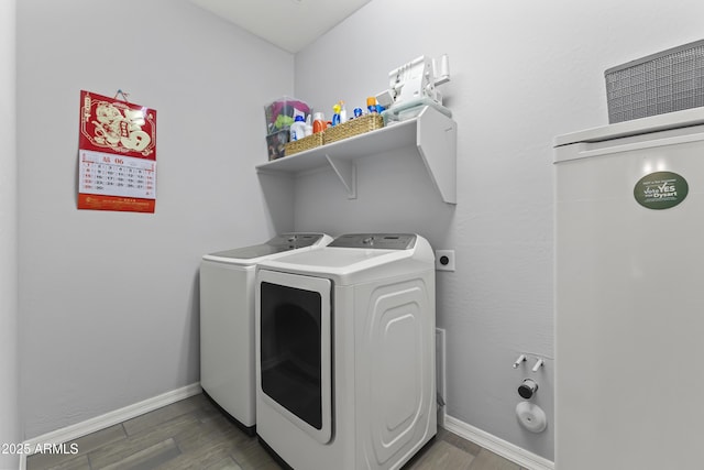 18865 W Mescal St, Surprise, AZ 85388 - laundry room featuring washing machine and dryer and wood finished floors