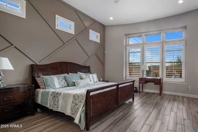 bedroom with recessed lighting, baseboards, and light wood-style floors