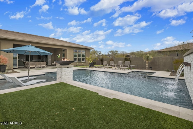 view of pool with a patio area, a yard, a fenced backyard, and a fenced in pool