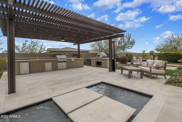 view of patio / terrace featuring an outdoor living space, grilling area, an outdoor kitchen, and a pergola