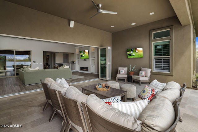 living room with recessed lighting and wood finished floors