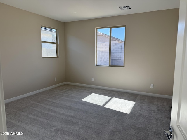 23214 W Miami St, Buckeye, AZ 85326 - carpeted spare room featuring healthy amount of natural light
