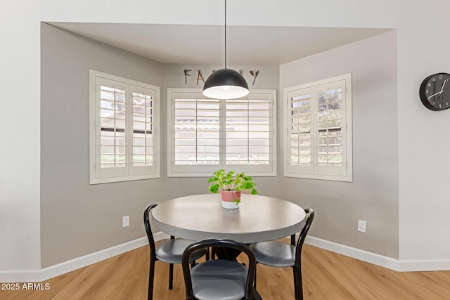 6017 E Kathleen Rd, Scottsdale, AZ 85254 - dining space featuring healthy amount of natural light and light wood-style floors