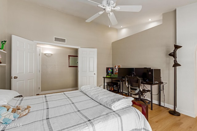 6017 E Kathleen Rd, Scottsdale, AZ 85254 - bedroom featuring light wood-style floors, high vaulted ceiling, a ceiling fan, and recessed lighting