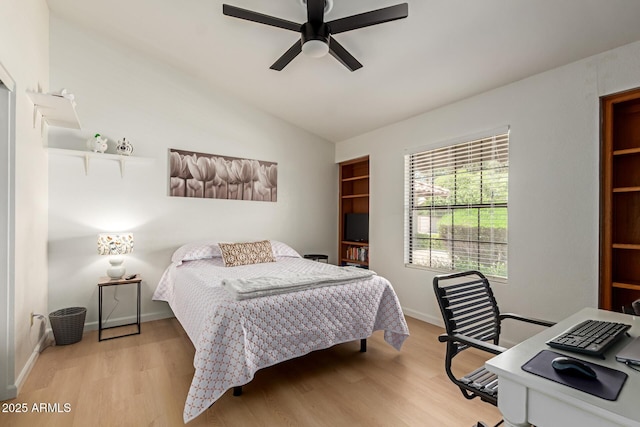 6017 E Kathleen Rd, Scottsdale, AZ 85254 - bedroom featuring light wood-style floors, vaulted ceiling, an office area, and ceiling fan