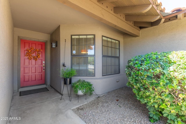 6017 E Kathleen Rd, Scottsdale, AZ 85254 - view of exterior entry with stucco siding and covered porch