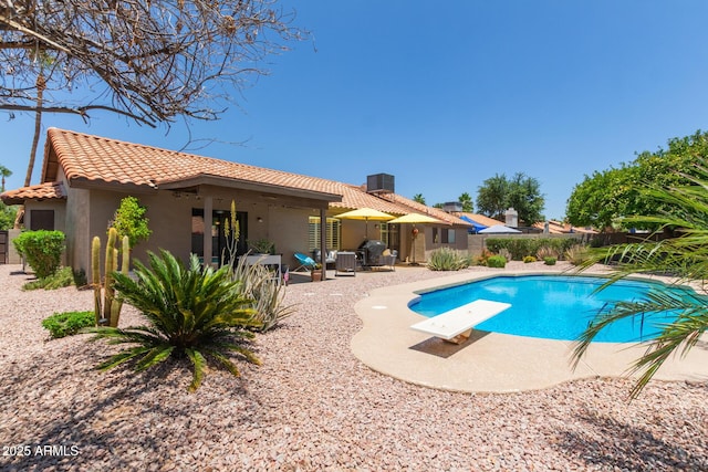 6017 E Kathleen Rd, Scottsdale, AZ 85254 - view of swimming pool with a diving board and a patio