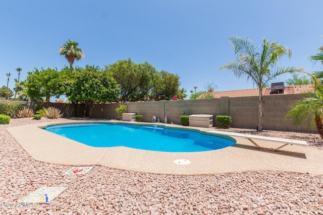 6017 E Kathleen Rd, Scottsdale, AZ 85254 - view of pool with a diving board and a fenced backyard