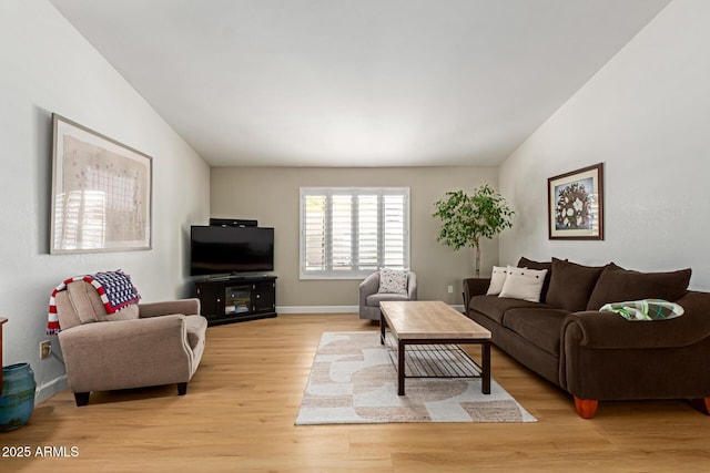 6017 E Kathleen Rd, Scottsdale, AZ 85254 - living room featuring light wood-style flooring and baseboards