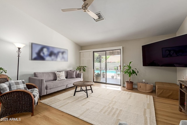 6017 E Kathleen Rd, Scottsdale, AZ 85254 - living area featuring wood finished floors, a ceiling fan, and lofted ceiling
