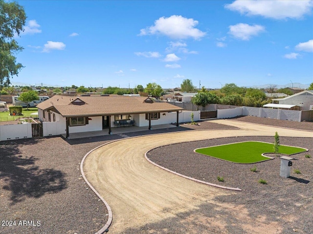 view of front of property featuring a patio