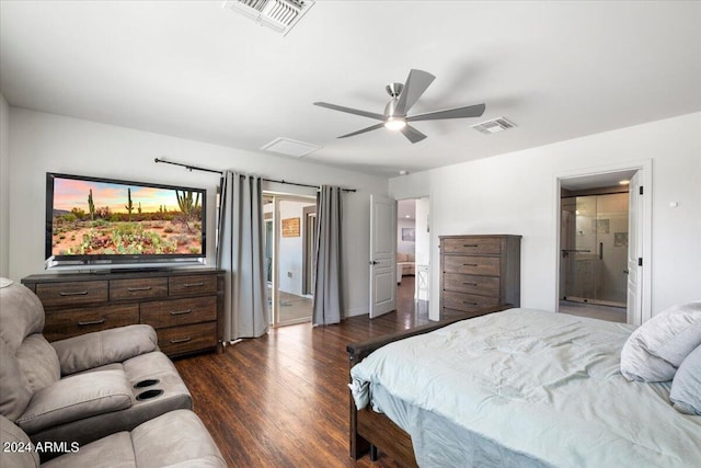 bedroom featuring ceiling fan, dark hardwood / wood-style flooring, and ensuite bath