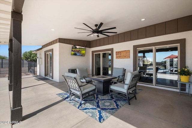 view of patio with ceiling fan