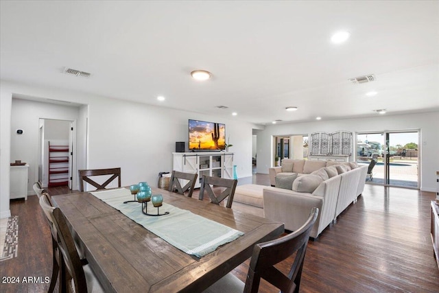 dining room with dark wood-type flooring