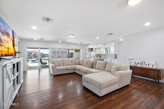 living room featuring dark hardwood / wood-style floors