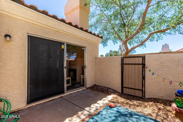 1111 W Summit Pl Unit 85, Chandler, AZ 85224 - view of patio / terrace featuring fence and a gate