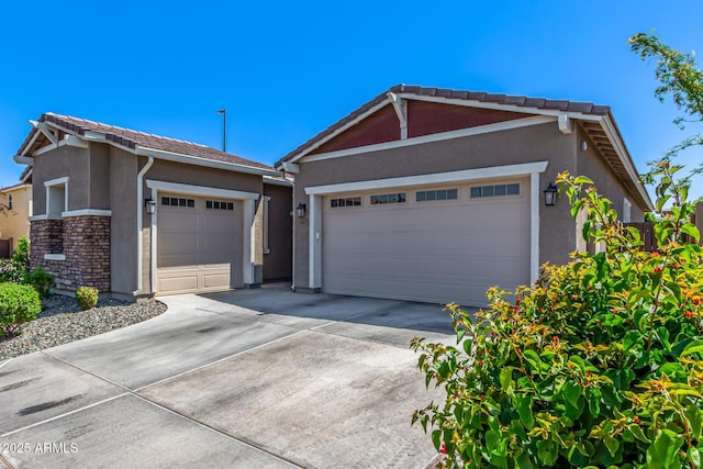 4077 S Quinn Ave, Gilbert, AZ 85297 - ranch-style home featuring an attached garage, stucco siding, driveway, and stone siding