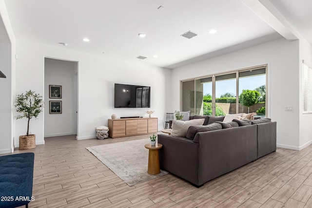 4077 S Quinn Ave, Gilbert, AZ 85297 - living area with baseboards, light wood-type flooring, and visible vents