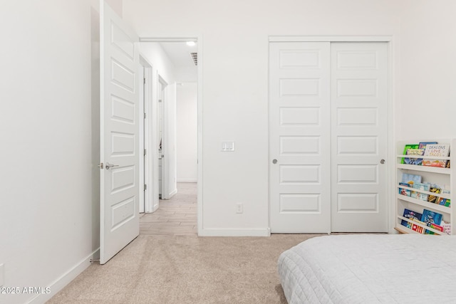 4077 S Quinn Ave, Gilbert, AZ 85297 - carpeted bedroom with baseboards and a closet
