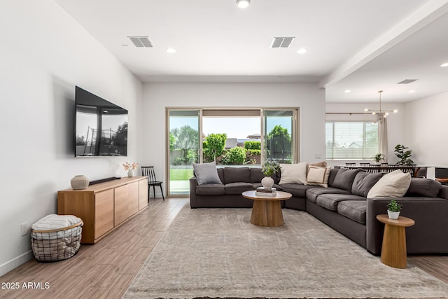 4077 S Quinn Ave, Gilbert, AZ 85297 - living room featuring visible vents, recessed lighting, and light wood-style floors