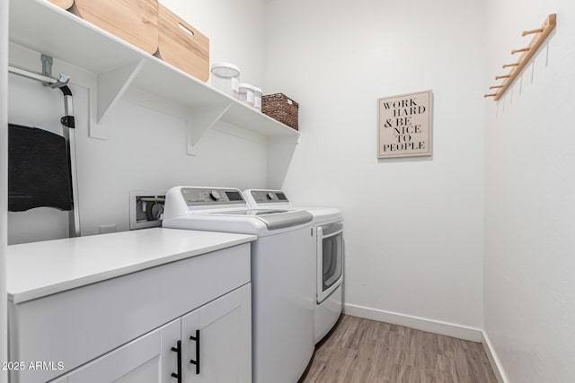 4077 S Quinn Ave, Gilbert, AZ 85297 - laundry area with baseboards, laundry area, light wood finished floors, and washer and clothes dryer