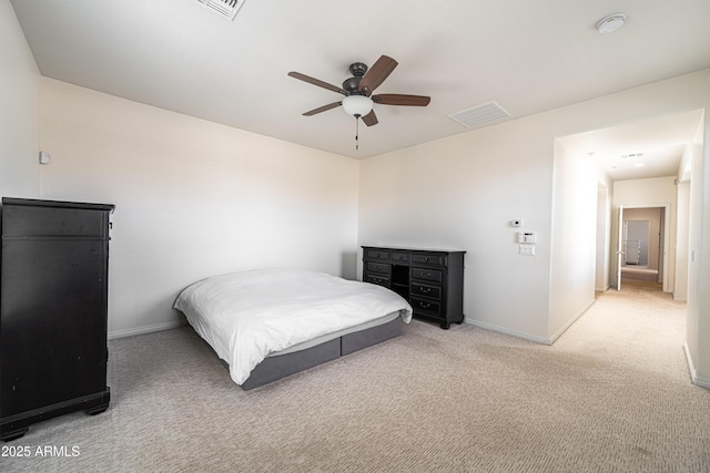 bedroom with light carpet, baseboards, and ceiling fan