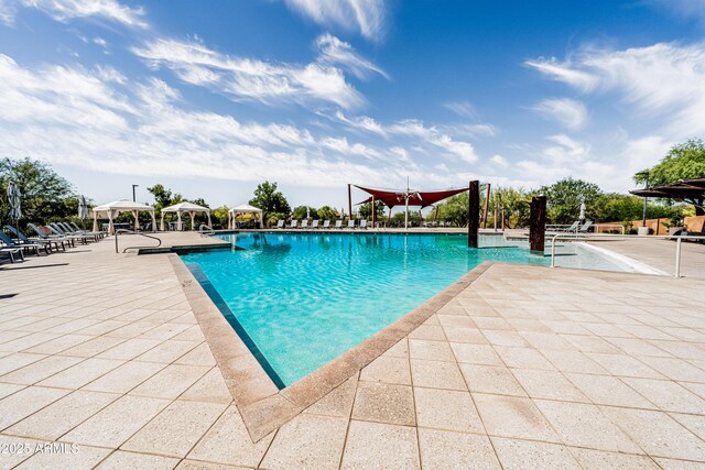 community pool with a patio