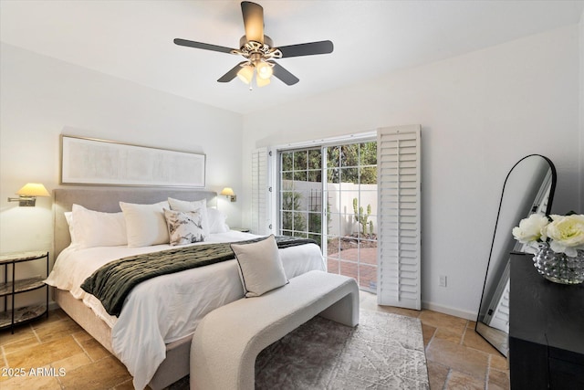 bedroom featuring ceiling fan and access to exterior