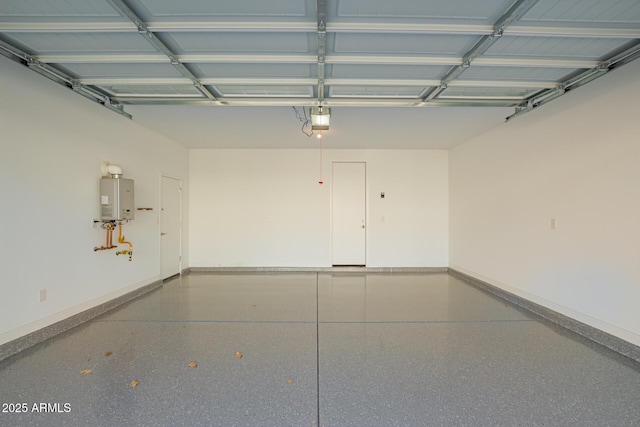 garage featuring tankless water heater and baseboards