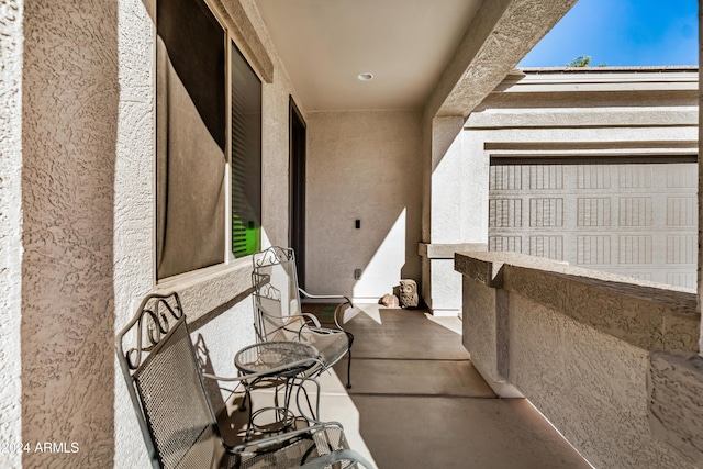 view of patio / terrace featuring a garage