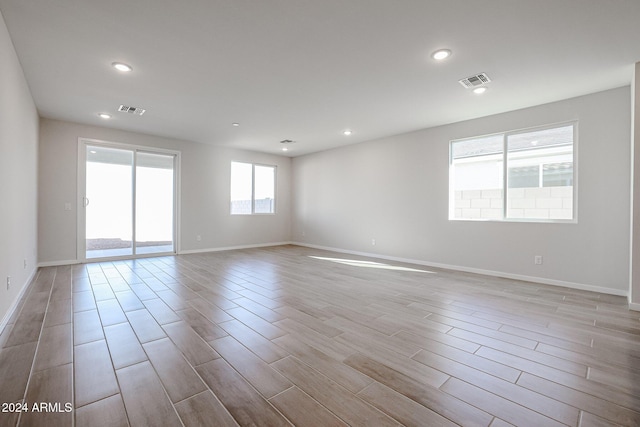 empty room with light wood-type flooring